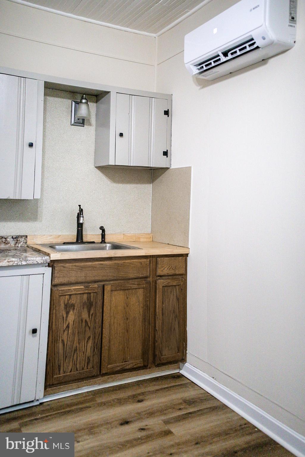 179 Main Street Hartly, DE 19953 - Photo 42 of 43 a kitchen with a sink and cabinets