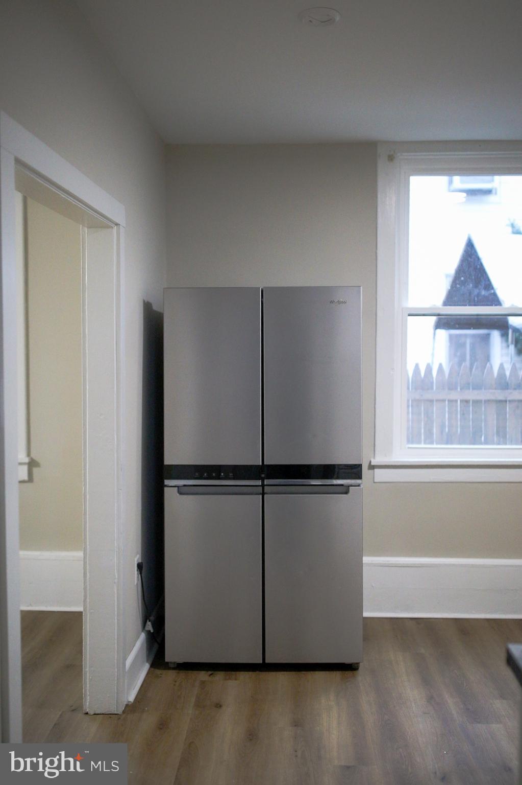 179 Main Street Hartly, DE 19953 - Photo 6 of 43 a refrigerator freezer sitting inside of a kitchen