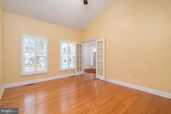 a kitchen with a stove a sink and a microwave