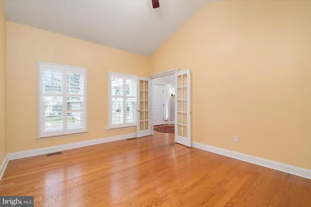 a kitchen with a stove a sink and a microwave
