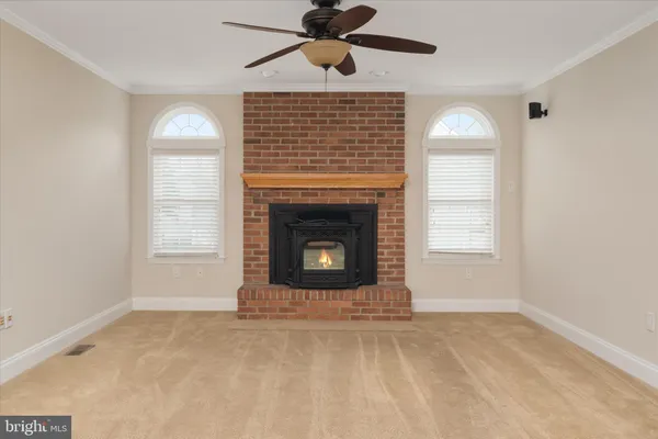 a view of a hallway with a window