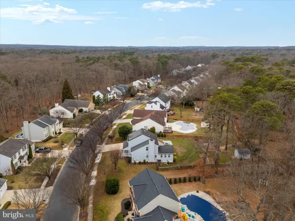 a swimming pool with wooden fence