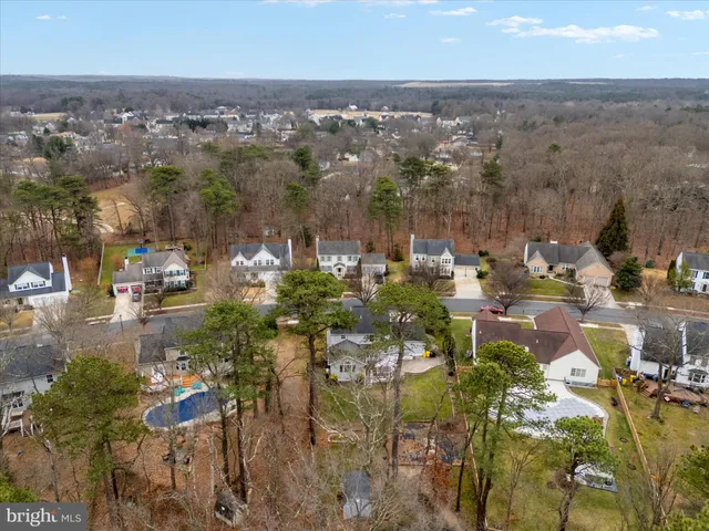 a view of outdoor space with trees and playing ground
