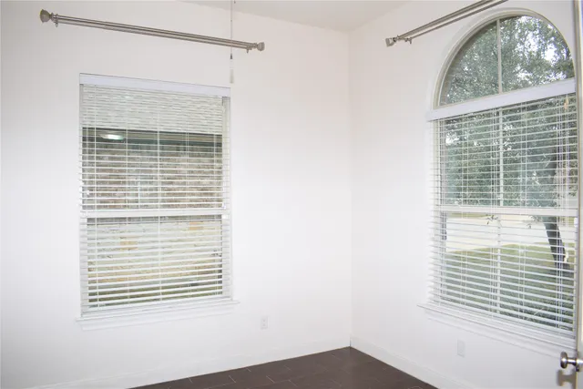 a view of a room that has a window in it