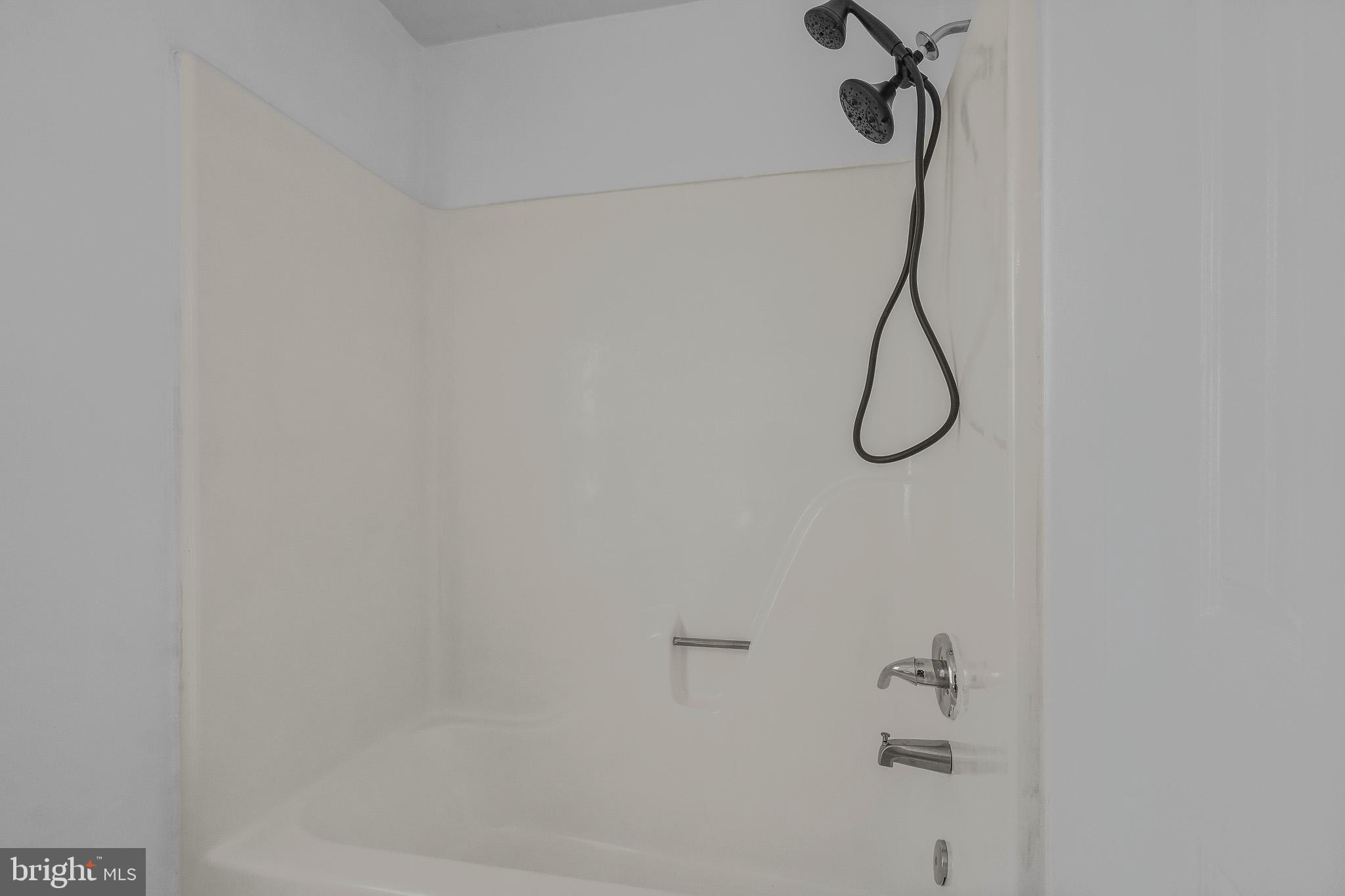9503 Fletcher Avenue Clinton, MD 20735 - Photo 19 of 27 a bathroom with a shower