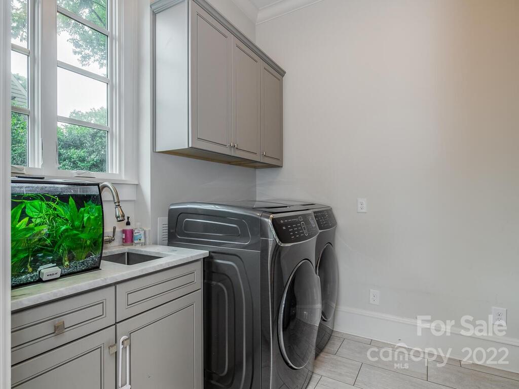 1210 Dilworth Road Charlotte, NC 28203 - Photo 12 of 39 a utility room with dryer and washer