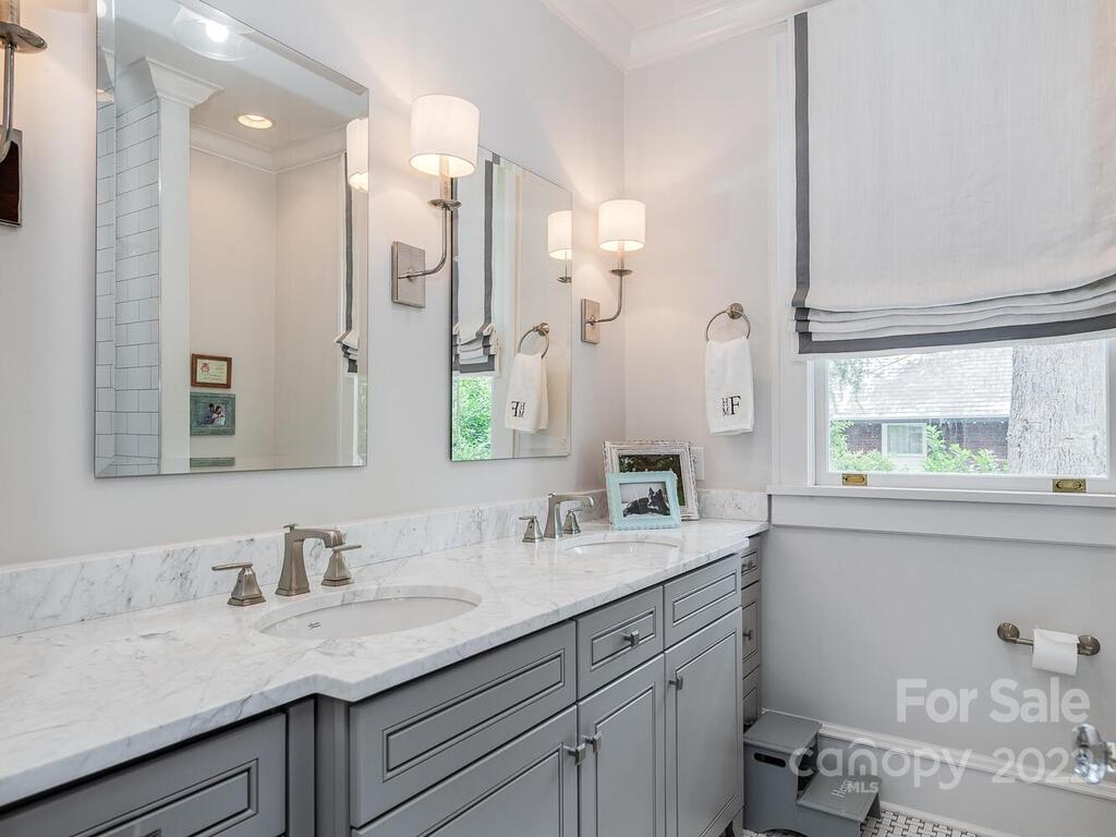 1210 Dilworth Road Charlotte, NC 28203 - Photo 25 of 39 a bathroom with a granite countertop sink mirror and double