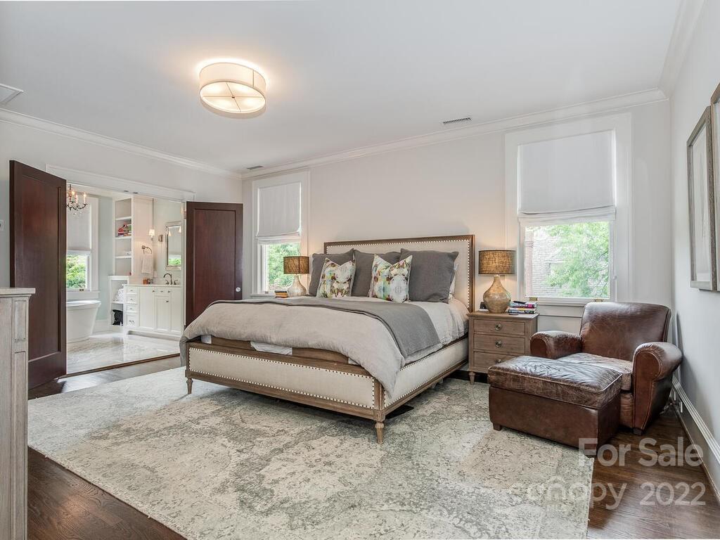 1210 Dilworth Road Charlotte, NC 28203 - Photo 29 of 39 a bedroom with a bed a couch and dresser