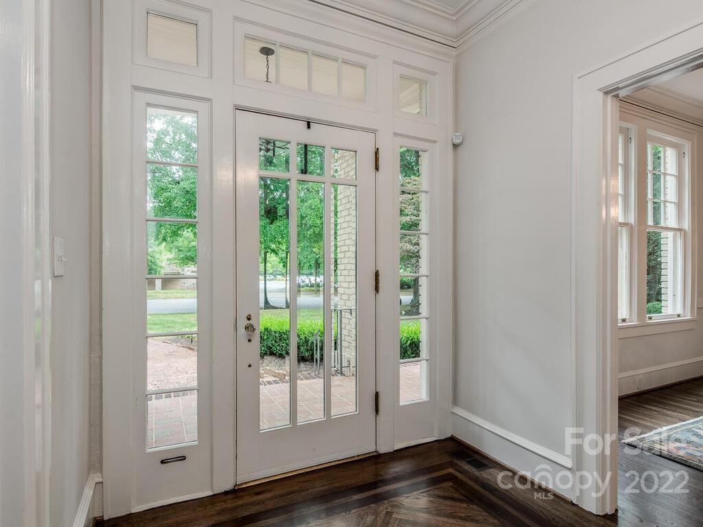 1210 Dilworth Road Charlotte, NC 28203 - Photo 4 of 39 a view of an entryway with wooden floor