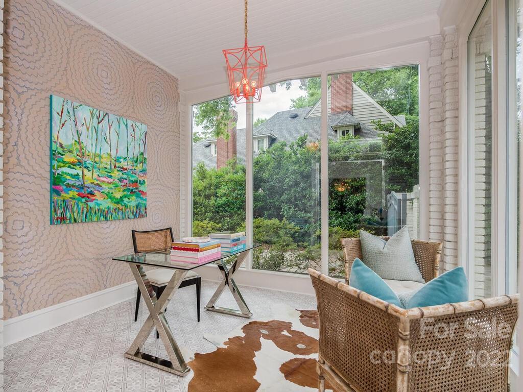 1210 Dilworth Road Charlotte, NC 28203 - Photo 7 of 39 a outdoor space with patio the couches and a dining table with garden view