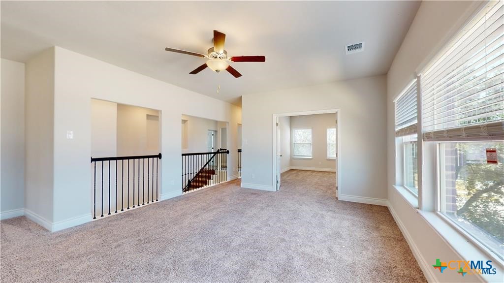 8601 Ridge Crest Drive Killeen, TX 76542 - Photo 11 of 30 a view of a livingroom with a staircase