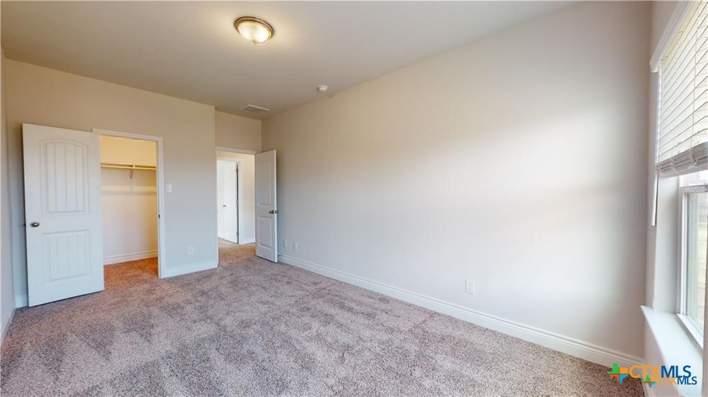 8601 Ridge Crest Drive Killeen, TX 76542 - Photo 16 of 30 an empty room with windows
