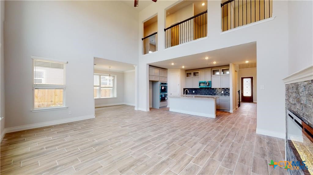8601 Ridge Crest Drive Killeen, TX 76542 - Photo 5 of 30 a view of an entryway with kitchen and windows
