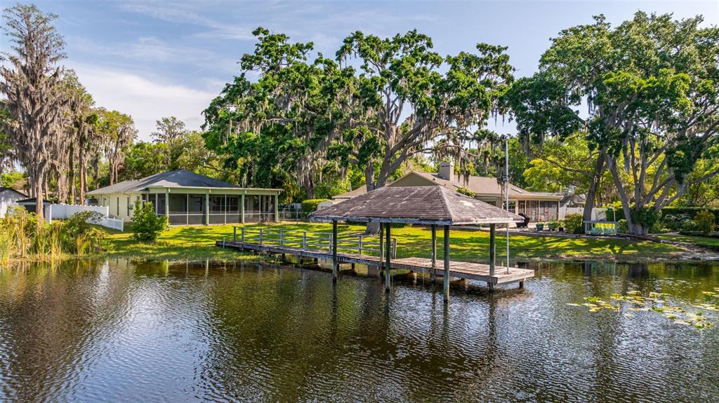 18132 Oakdale Road Odessa, FL 33556 - Photo 34 of 40 a view of a lake with houses