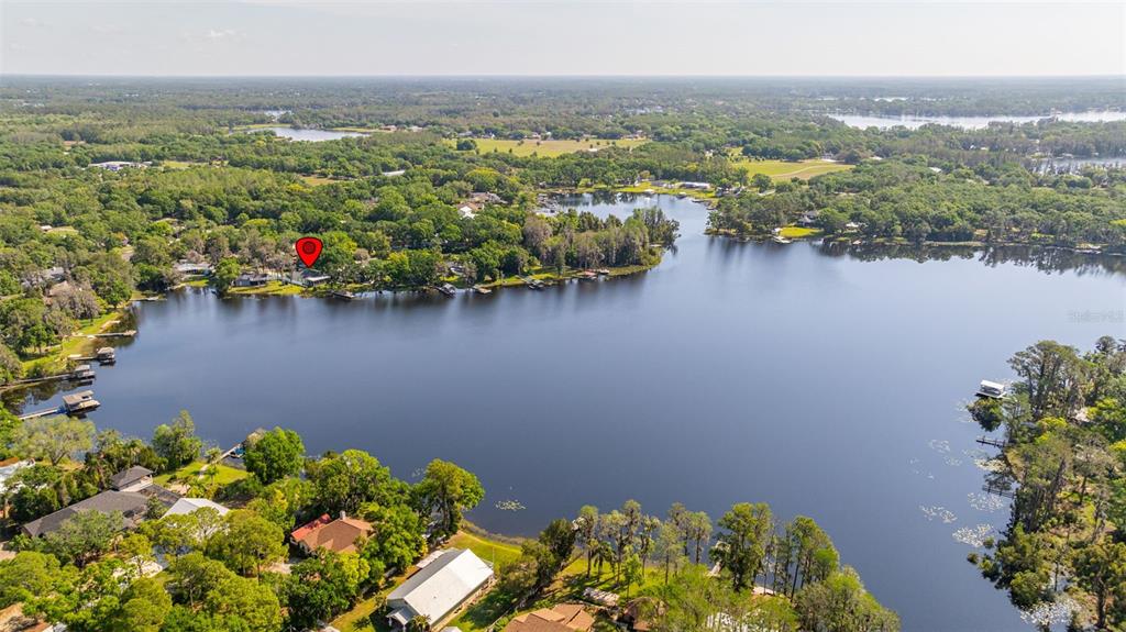 18132 Oakdale Road Odessa, FL 33556 - Photo 38 of 40 an aerial view of residential houses with outdoor space and lake view