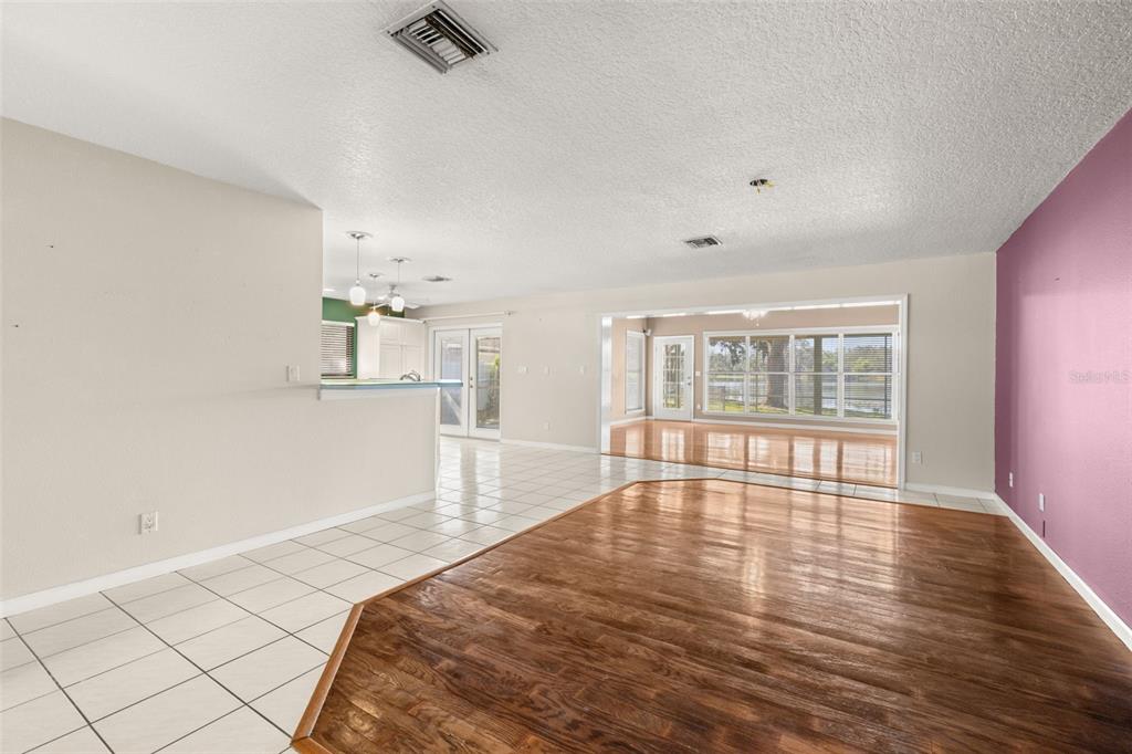 18132 Oakdale Road Odessa, FL 33556 - Photo 8 of 40 a spacious bedroom with a bed and a large window