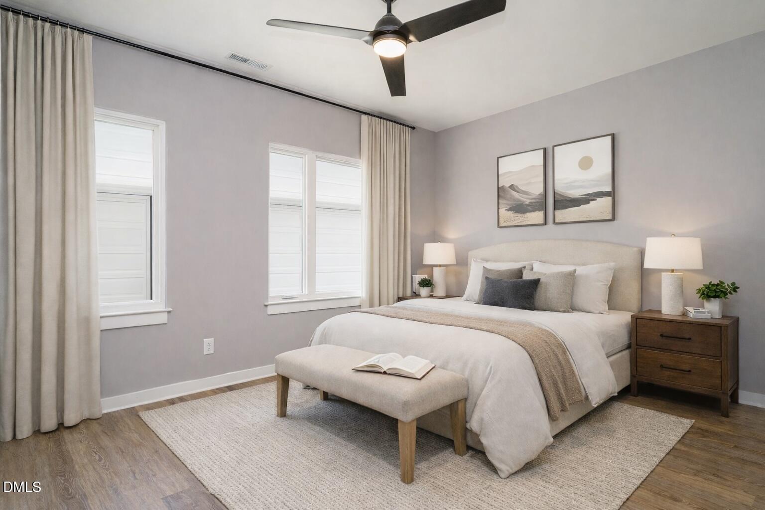 1525 Urban Trace Lane Raleigh, NC 27608 - Photo 19 of 33 a bedroom with a bed and a window