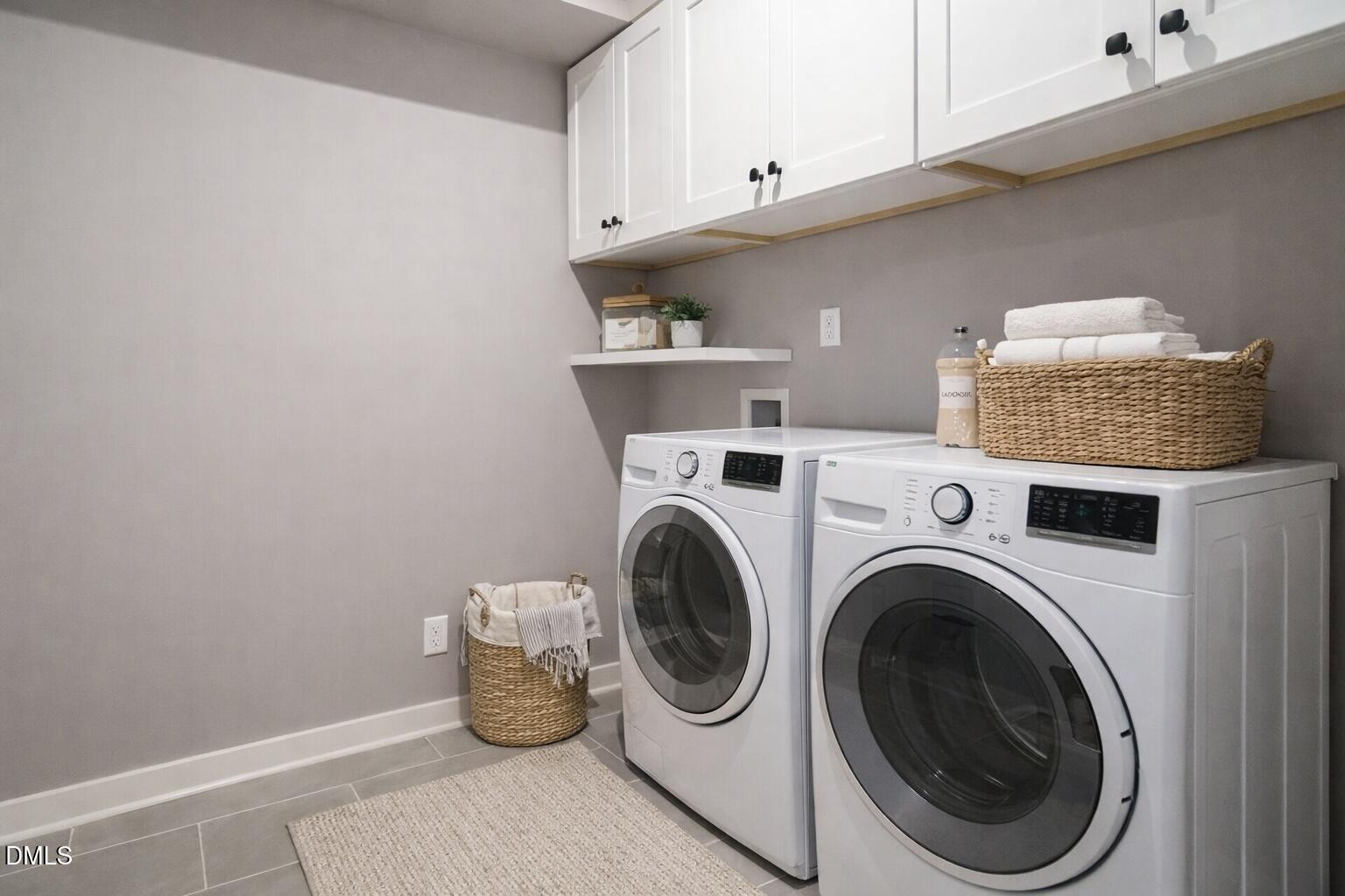 1525 Urban Trace Lane Raleigh, NC 27608 - Photo 23 of 33 a utility room with dryer and washer
