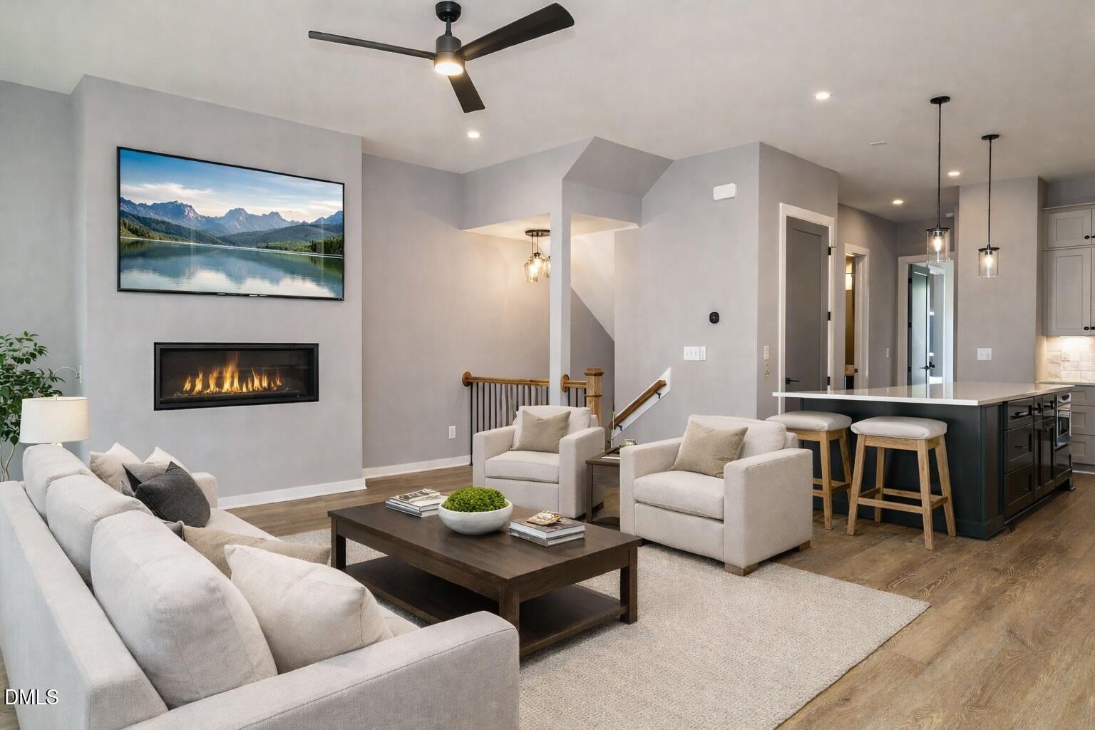 1525 Urban Trace Lane Raleigh, NC 27608 - Photo 6 of 33 a living room with furniture and a fireplace