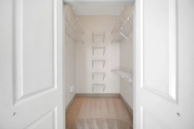 a view of a closet in a room