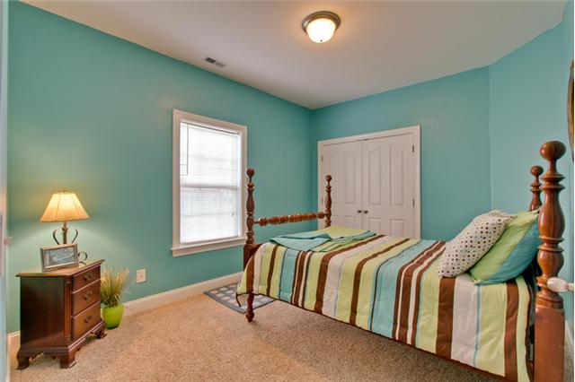 820 Renaissance Avenue Murfreesboro, TN 37129 - Photo 16 of 19 Bedroom 2 features a very happy "POP" of color for your guests or family members.
