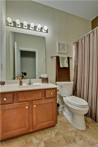 820 Renaissance Avenue Murfreesboro, TN 37129 - Photo 18 of 19 The guest bath; tastefully decorated and featuring lovely tile flooring and a tub/shower combo.