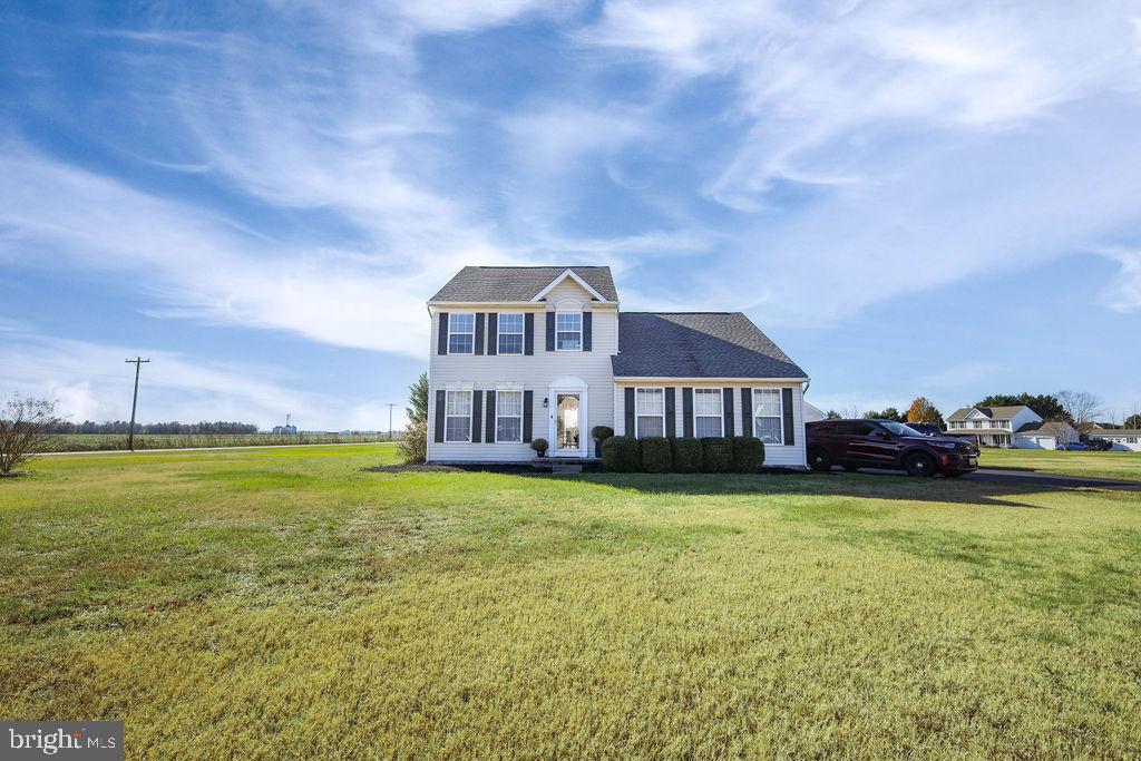 4445 Rolling Acres Drive Hurlock, MD 21643 - Photo 1 of 35 a view of a house with a garden and yard