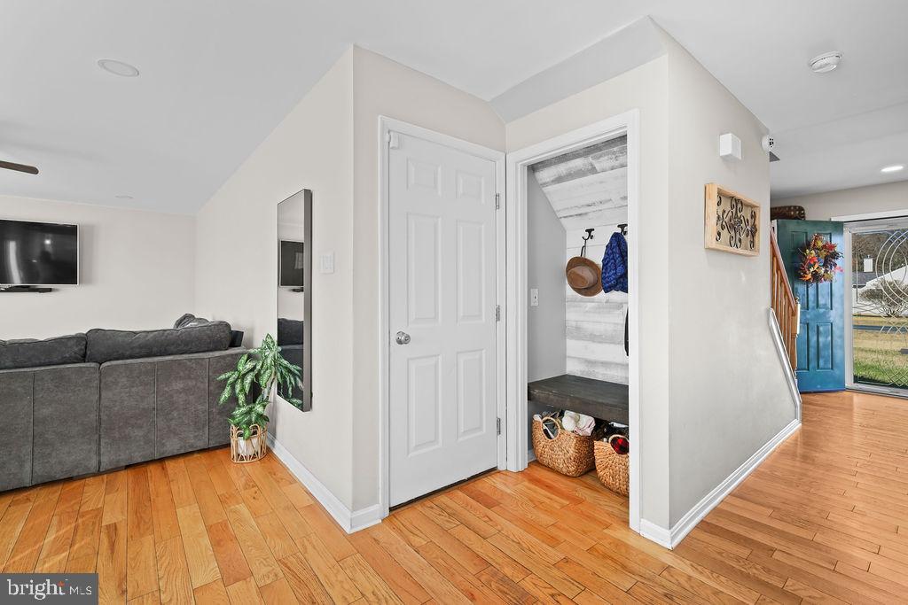 4445 Rolling Acres Drive Hurlock, MD 21643 - Photo 11 of 35 a living room with furniture and a wooden floor