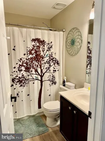 a bedroom with furniture and a bed