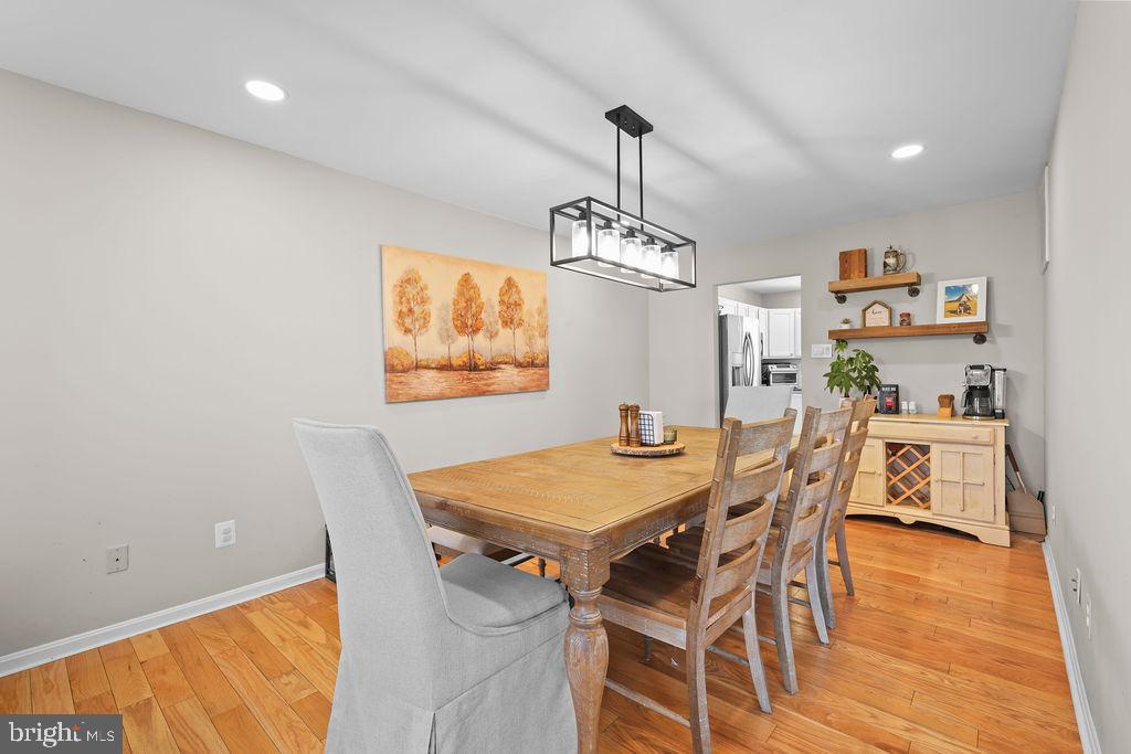 4445 Rolling Acres Drive Hurlock, MD 21643 - Photo 18 of 35 a view of a dining room with furniture and wooden floor