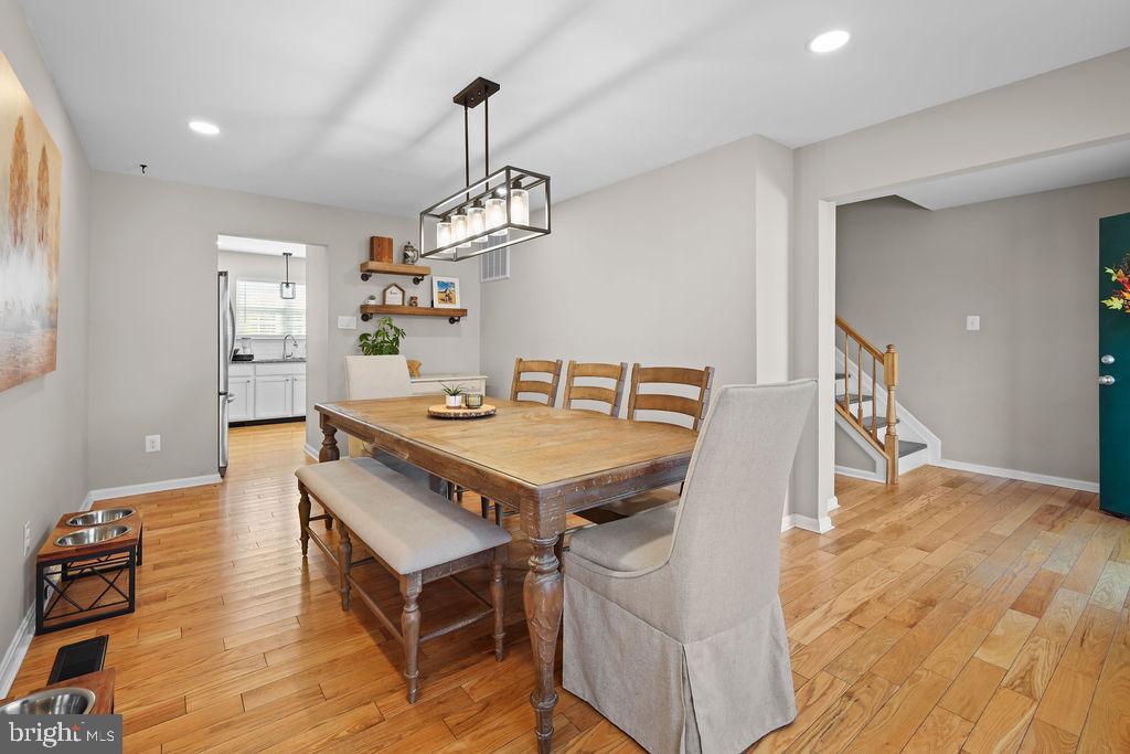 4445 Rolling Acres Drive Hurlock, MD 21643 - Photo 19 of 35 a view of a dining room with furniture and wooden floor