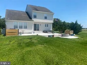 a sign that is on a brick wall