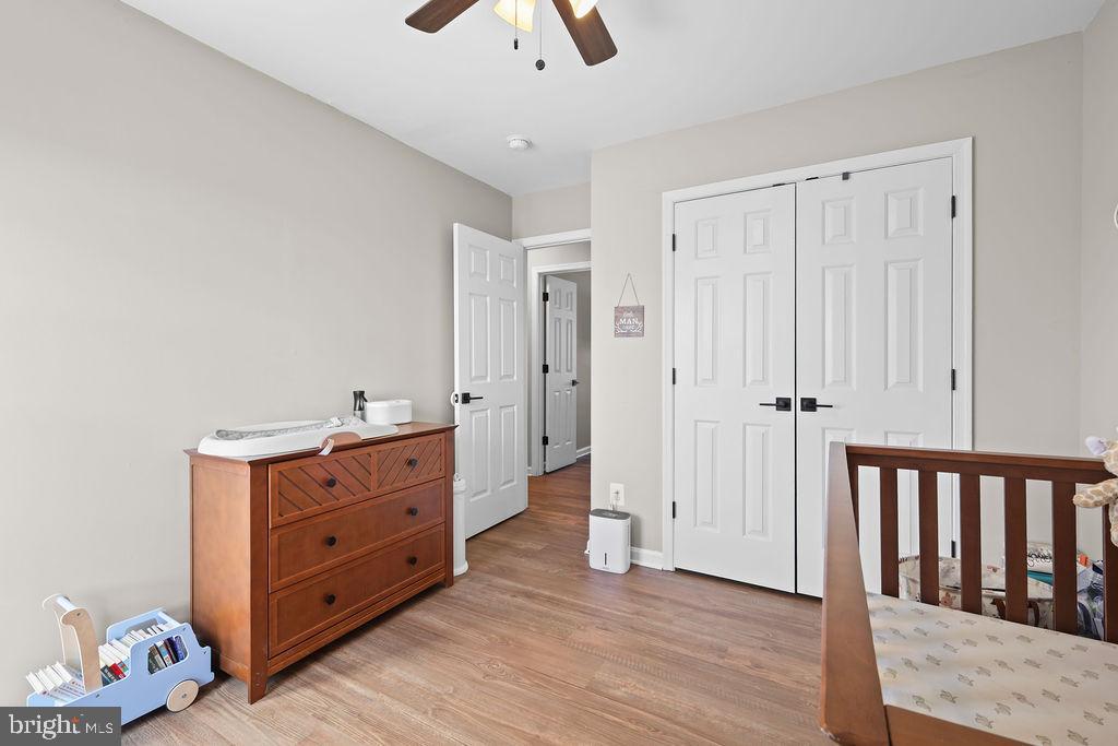 4445 Rolling Acres Drive Hurlock, MD 21643 - Photo 25 of 35 a room with furniture and wooden floor