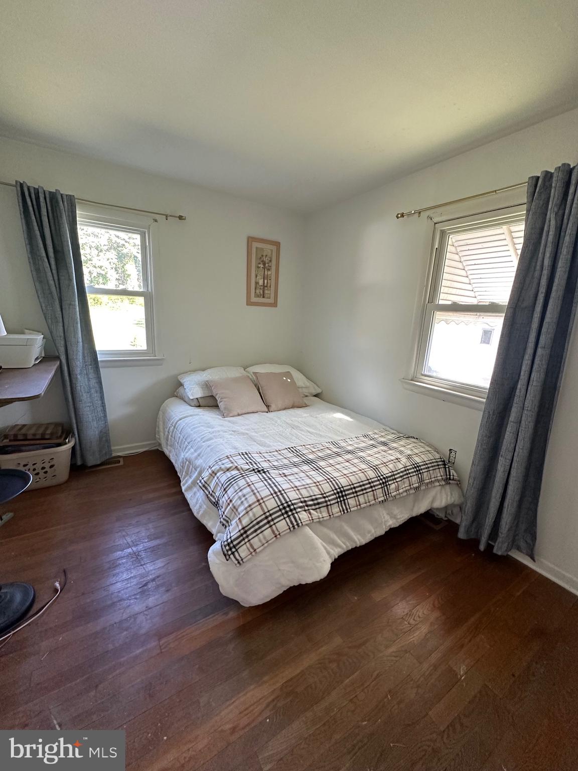 7009 Beulah Road Hurlock, MD 21643 - Photo 11 of 29 a bedroom with a bed and a window