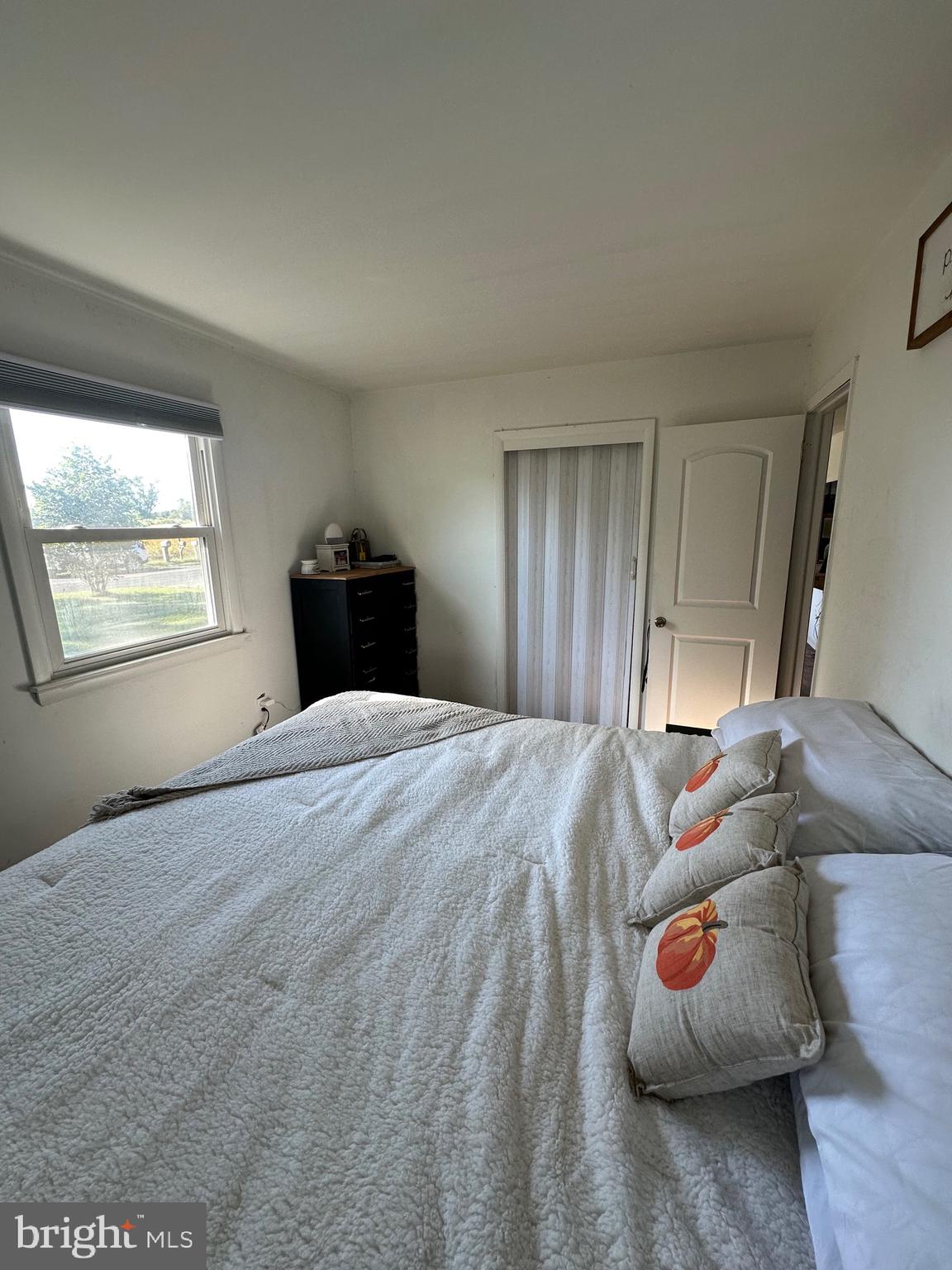 7009 Beulah Road Hurlock, MD 21643 - Photo 12 of 29 a bedroom with a bed and window