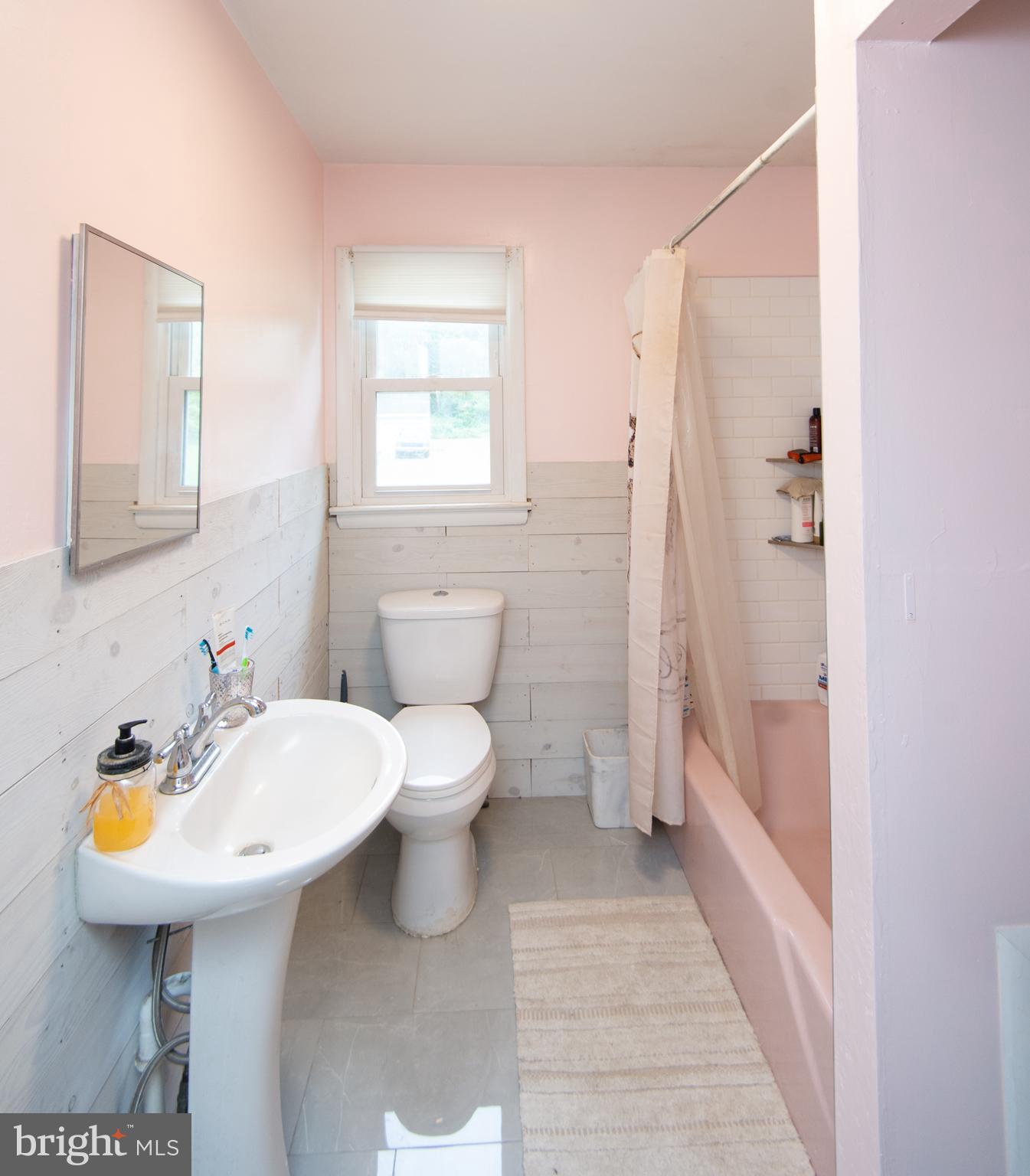 7009 Beulah Road Hurlock, MD 21643 - Photo 14 of 29 a bathroom with a sink a toilet and shower