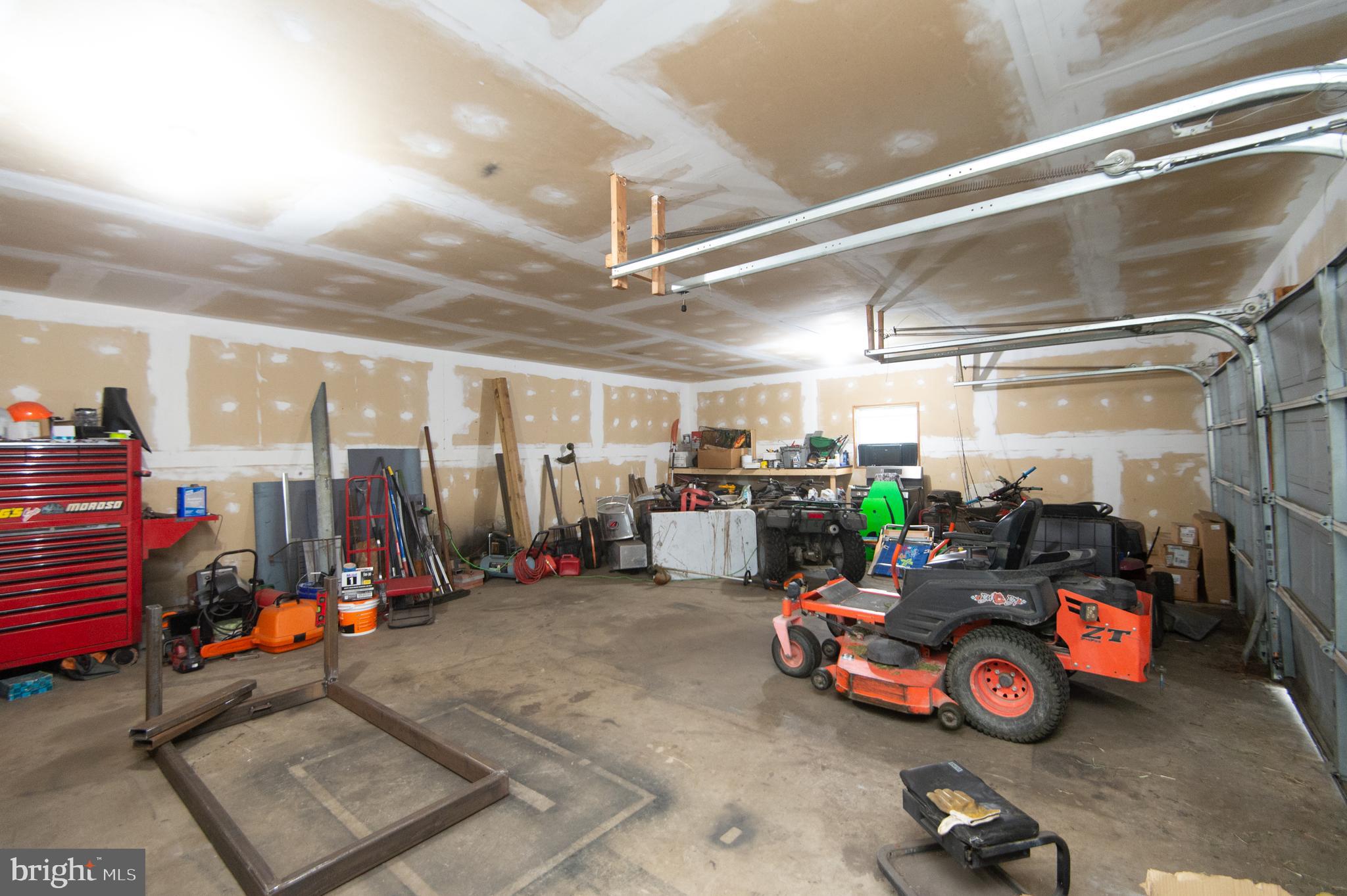 7009 Beulah Road Hurlock, MD 21643 - Photo 25 of 29 a view of a garage with rack and bicycle