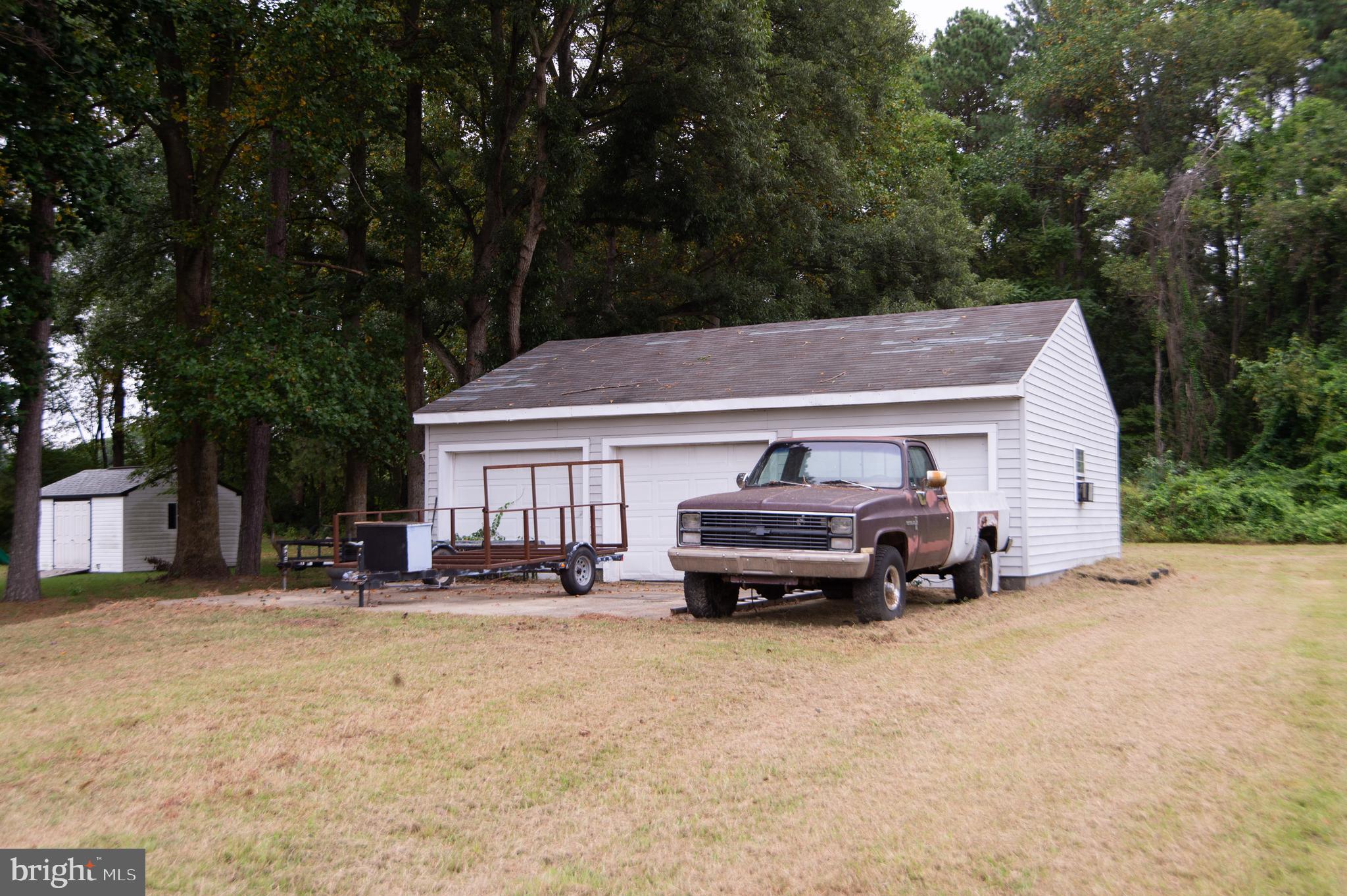 7009 Beulah Road Hurlock, MD 21643 - Photo 26 of 29 a car parked in front of house