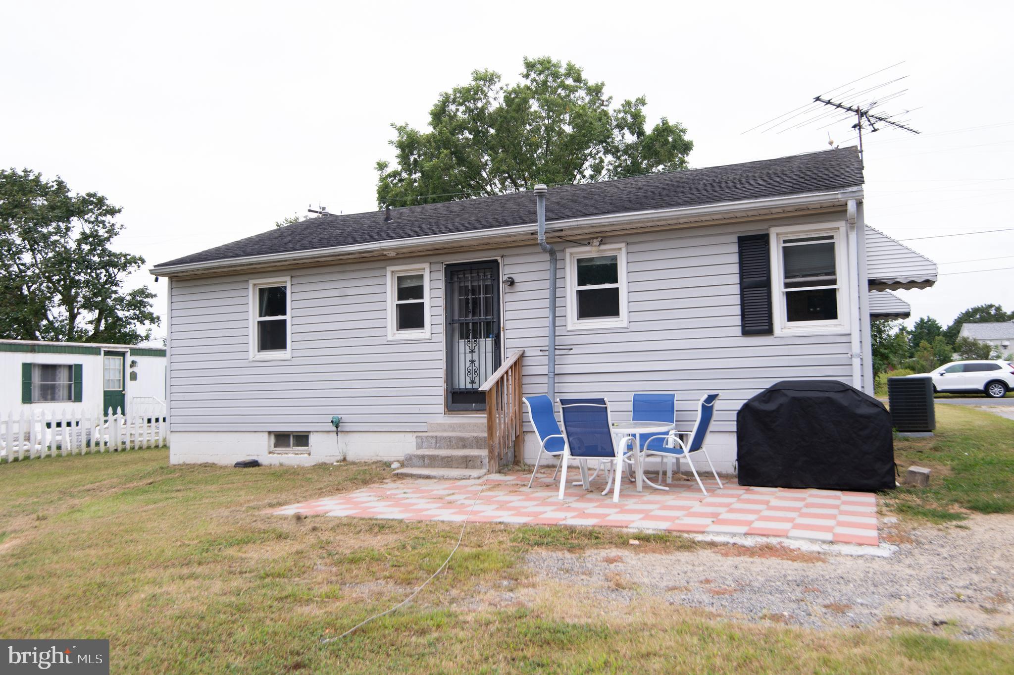7009 Beulah Road Hurlock, MD 21643 - Photo 29 of 29 a view of a house with a backyard