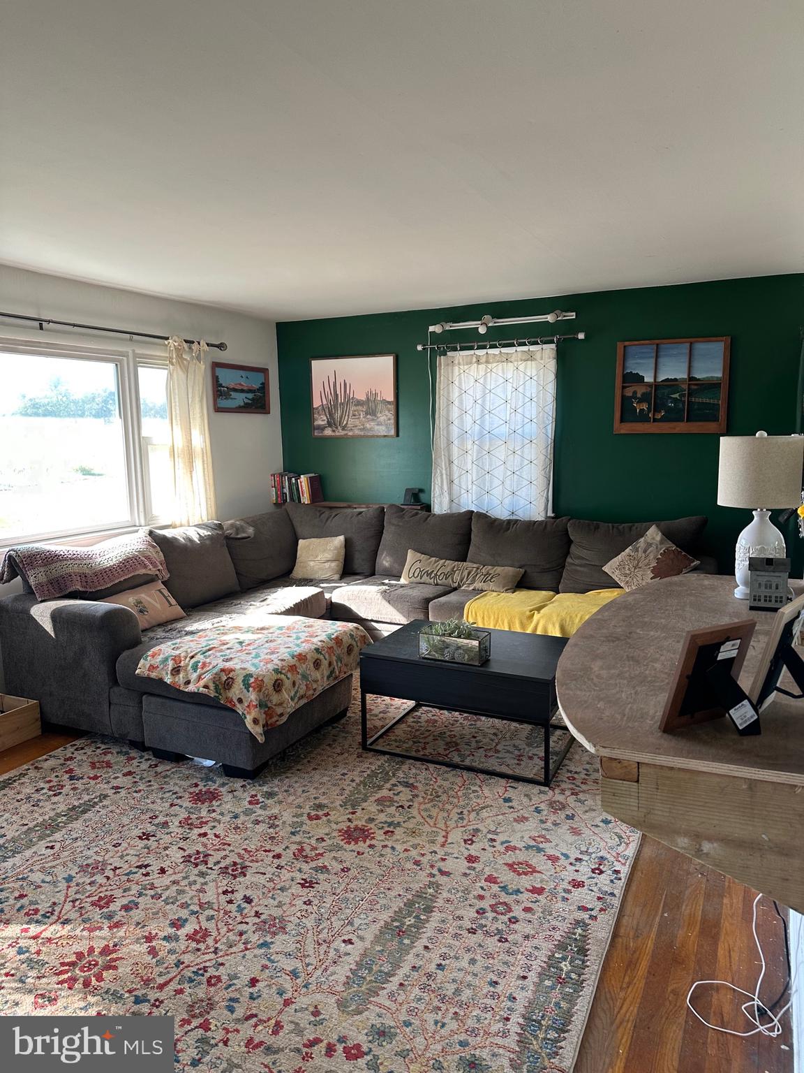 7009 Beulah Road Hurlock, MD 21643 - Photo 7 of 29 a living room with furniture and a flat screen tv
