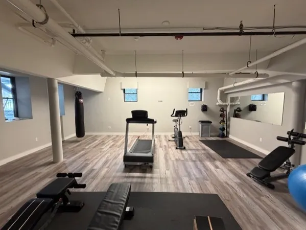 a view of a room with gym equipment