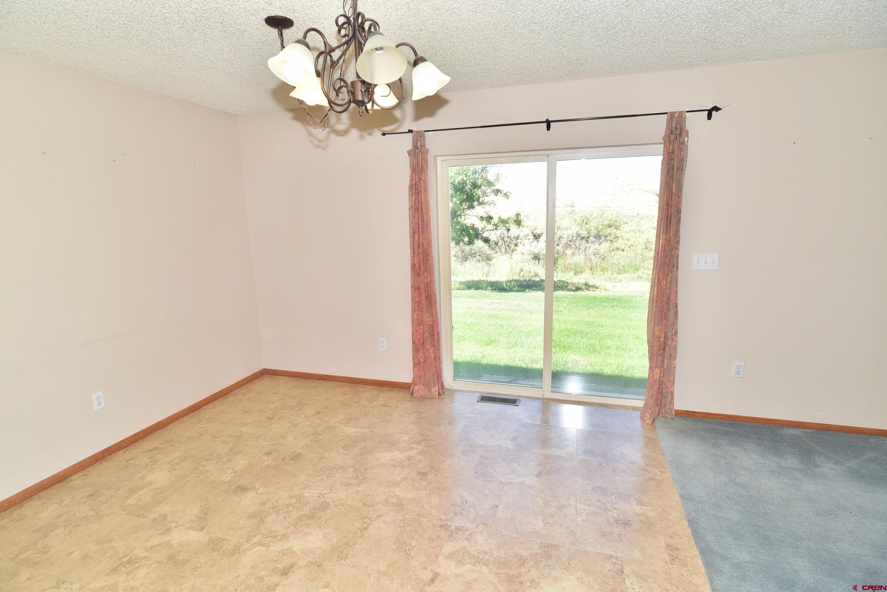 68600 Kinikin Road Montrose, CO 81403 - Photo 12 of 44 a view of a room with a large window