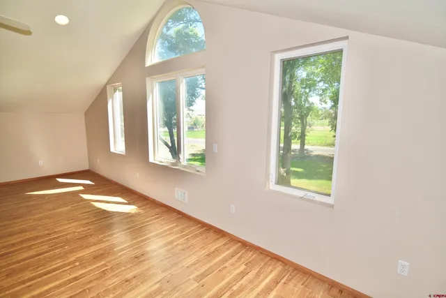 a view of an empty room and window