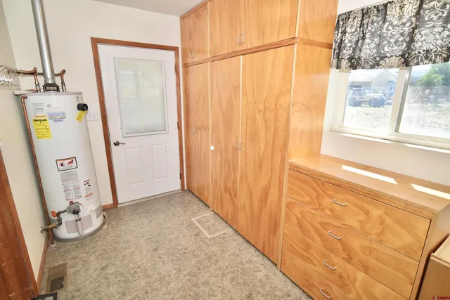 a view of a utility room with a sink
