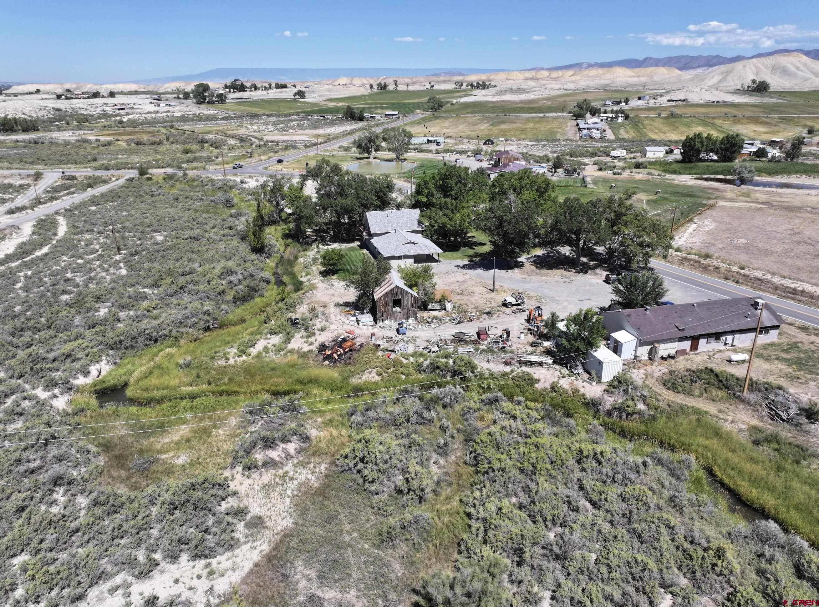 68600 Kinikin Road Montrose, CO 81403 - Photo 42 of 44 an aerial view of multiple house