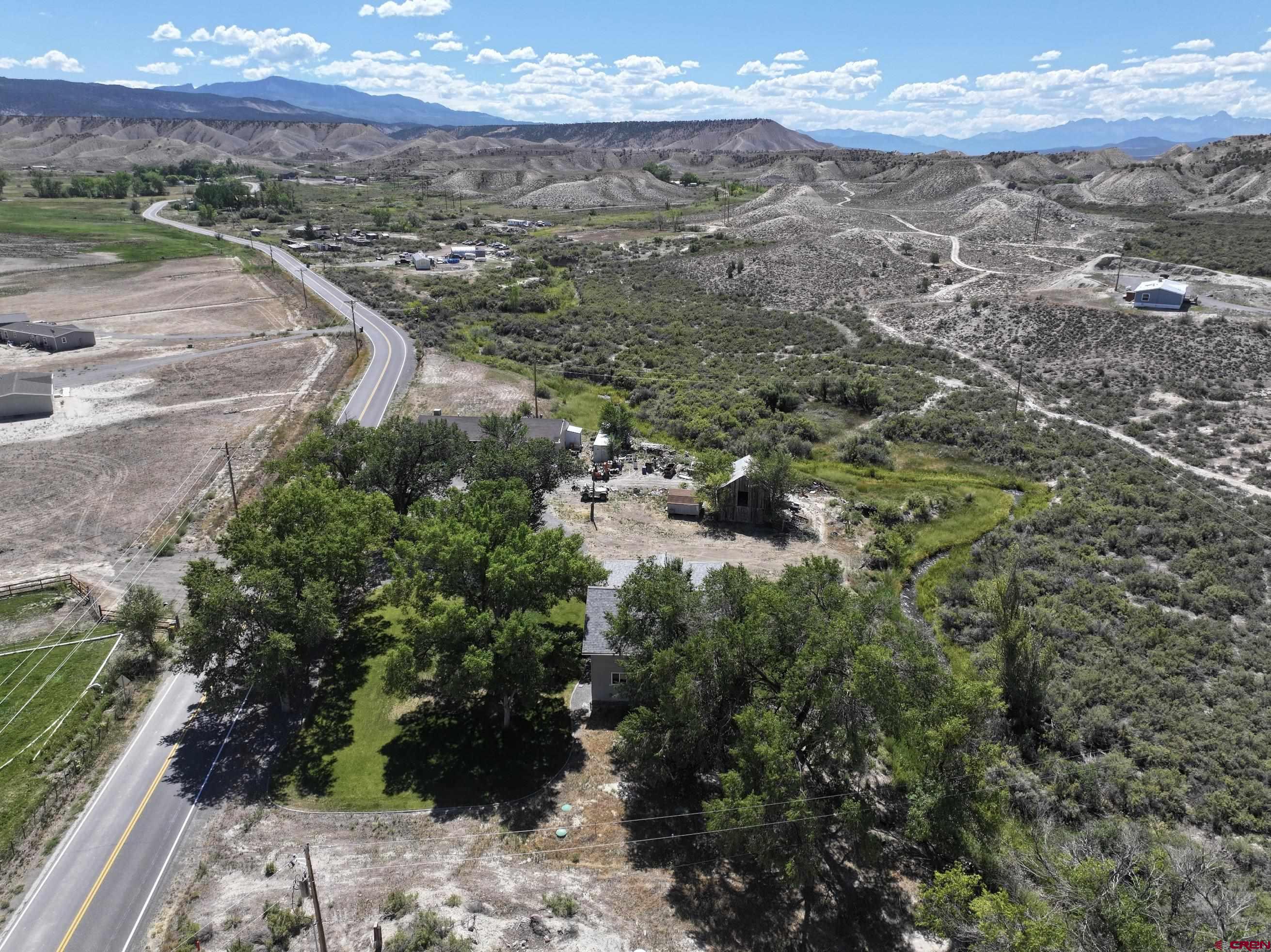68600 Kinikin Road Montrose, CO 81403 - Photo 44 of 44 a view of a street with a mountain