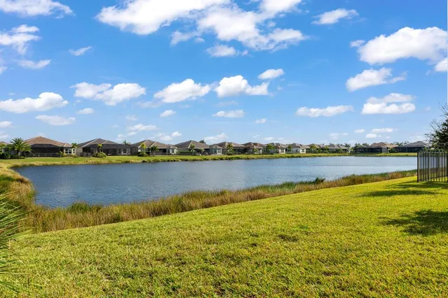 a view of a house with a big yard