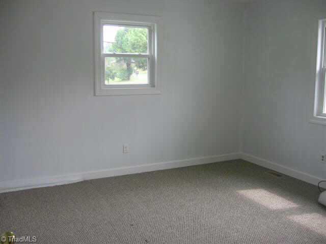 5261 Darr Road Trinity, NC 27370 - Photo 5 of 9 Other. Master bedroom/bathroom with shower. East end of home.