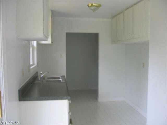 5261 Darr Road Trinity, NC 27370 - Photo 6 of 9 Other. Kitchen with laundry room at back entrance.
