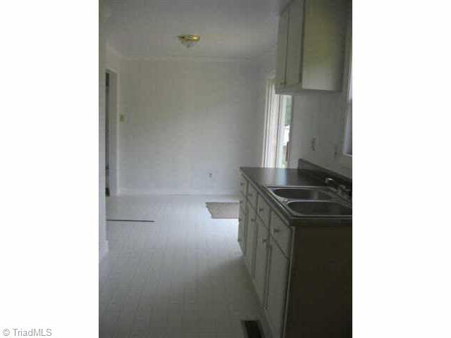 5261 Darr Road Trinity, NC 27370 - Photo 7 of 9 Other. Dining area beside kitchen. Sliding glass door accesses back deck.